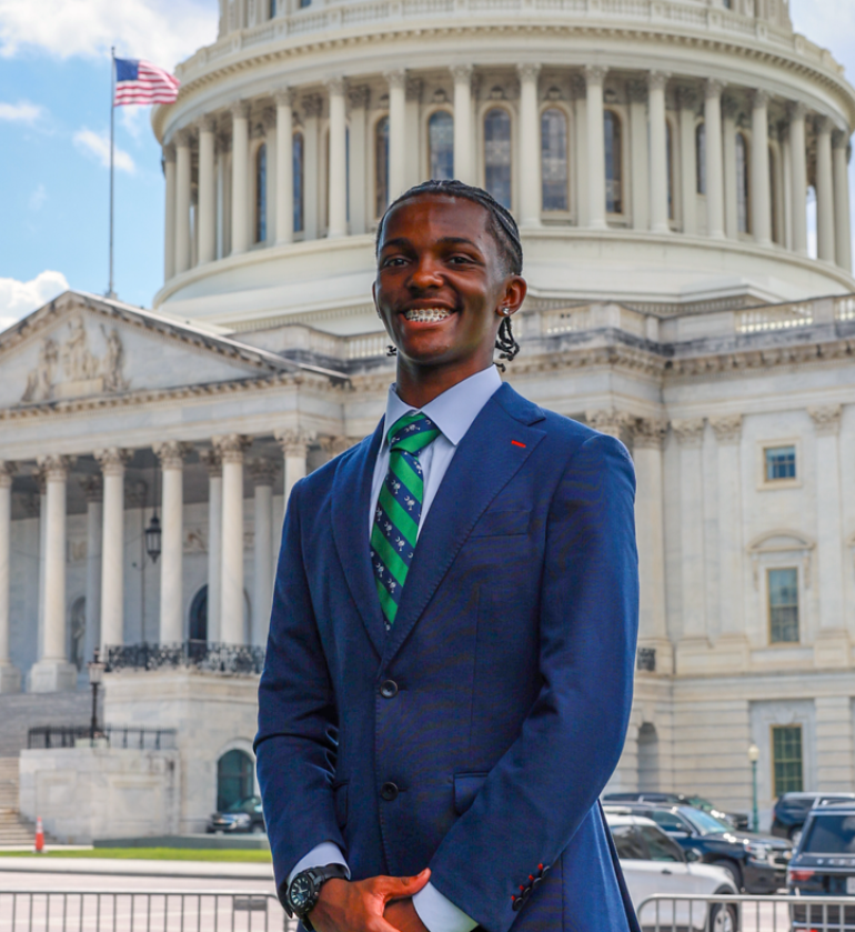 Kameron Haynie in front of the U.S. Capitol building